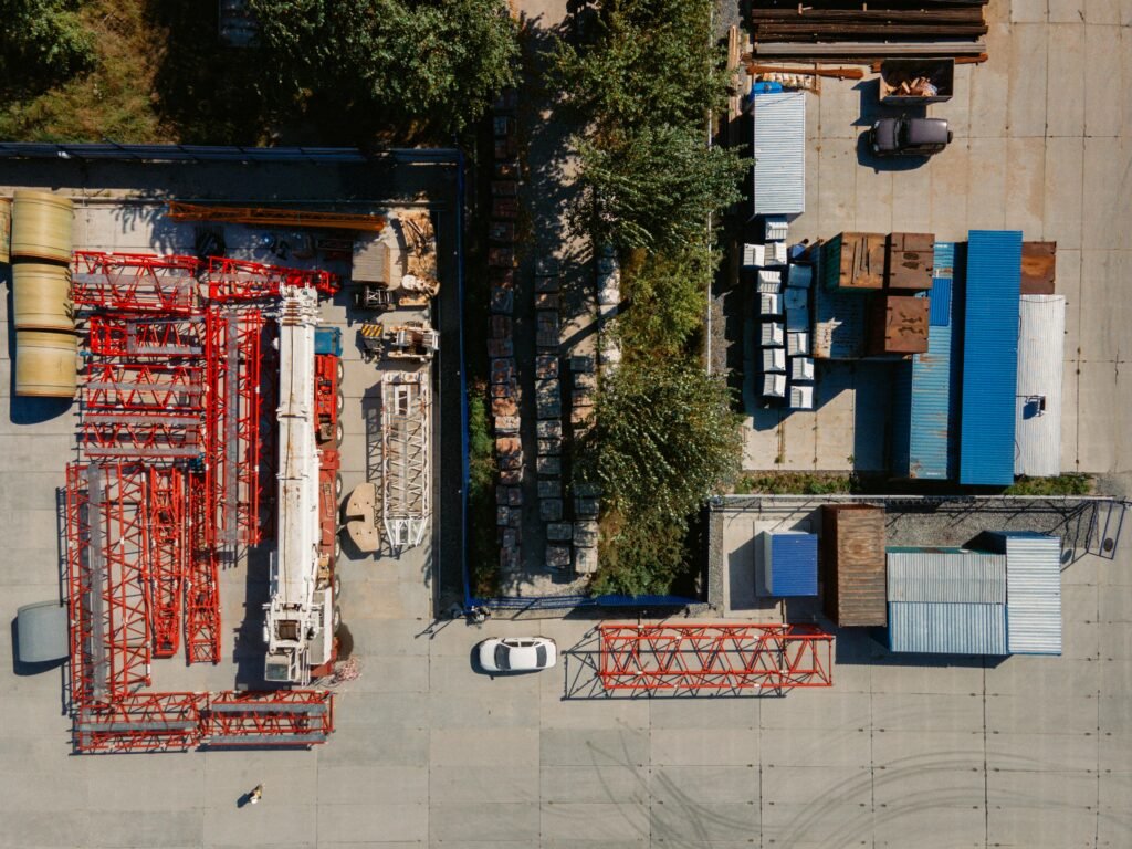 Aerial image of an industrial area with construction materials in Novosibirsk, Russia.